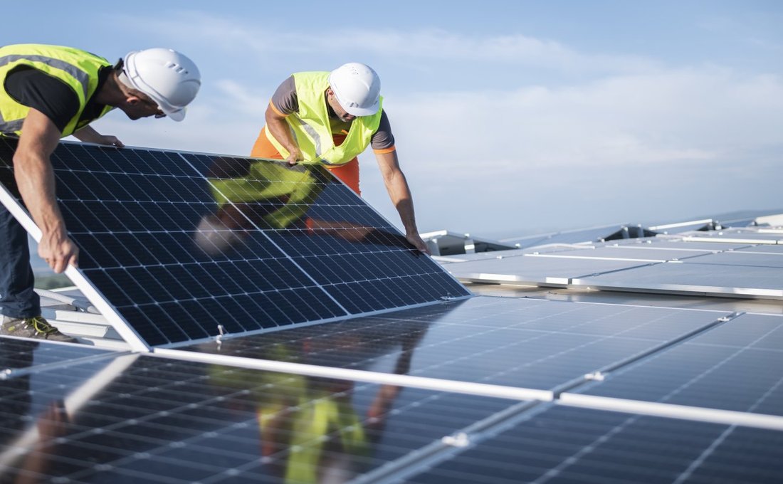 Two Men Installing Solar Panels