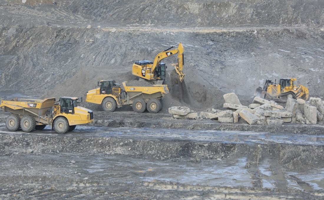 Landfill with Cat Equipment on Hill