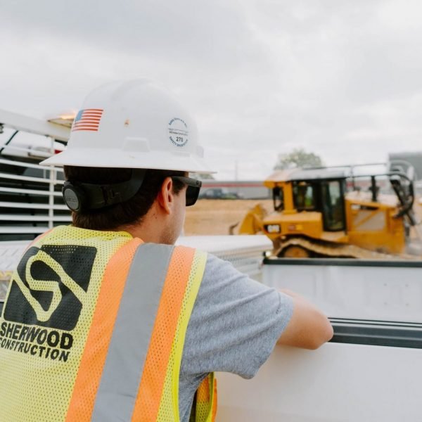 Sherwood Construction Operator Watching Motor Grader