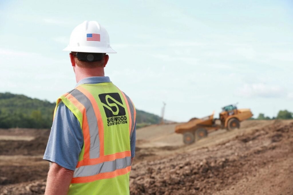 Sherwood Construction Operator Watching Excavator