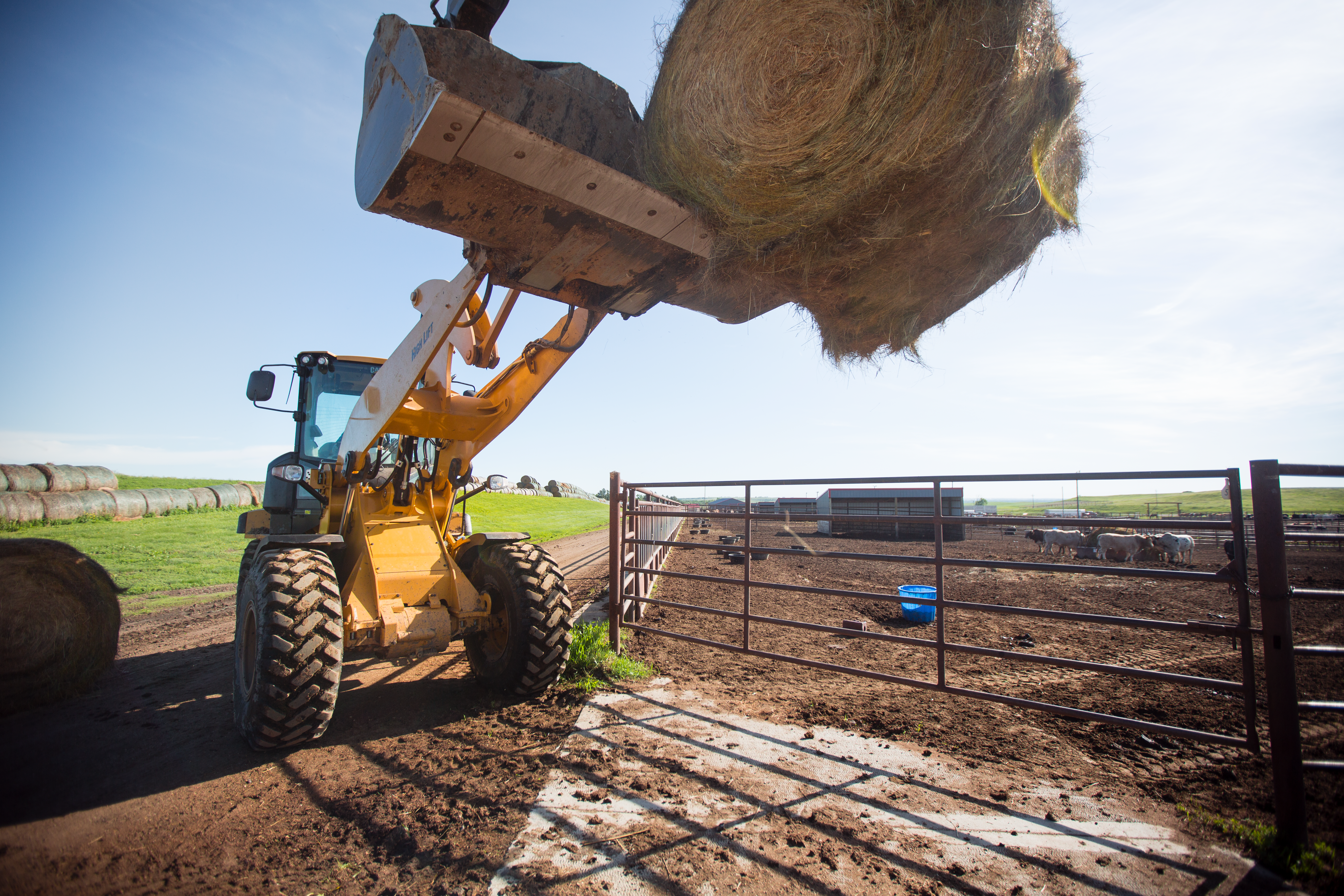 Caterpillar Wheel Loader Handling Bale
